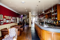 A vibrant in-house bar area with comfortable seating.