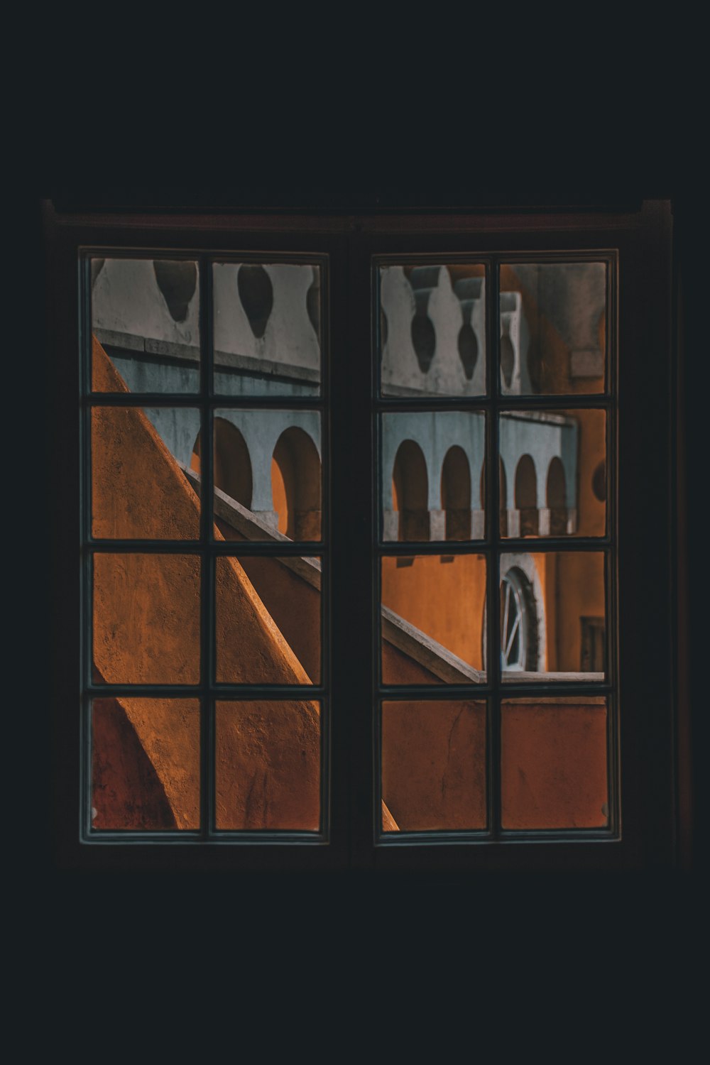 brown wooden 16-lite windowpane