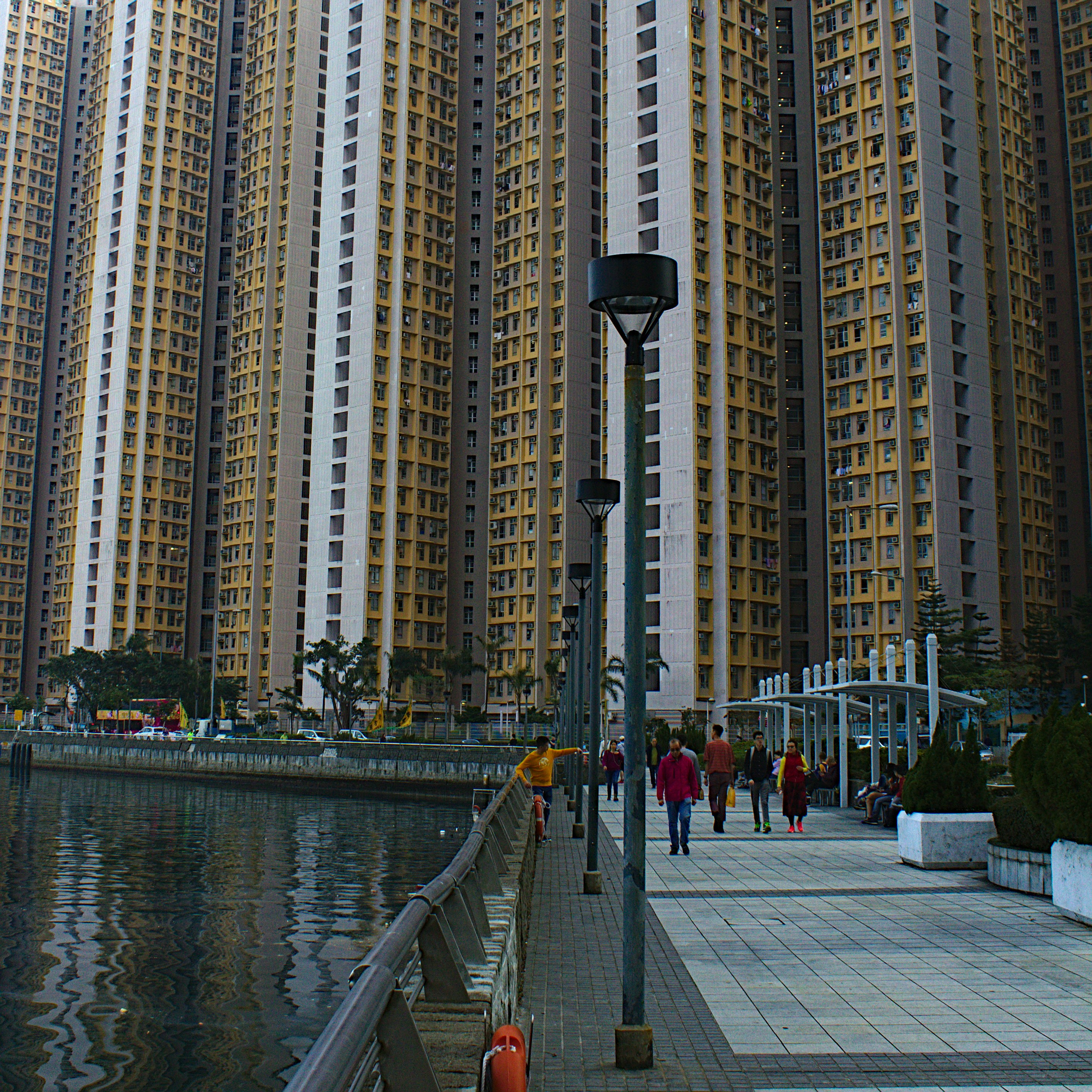 people walking near high-rise building during daytime