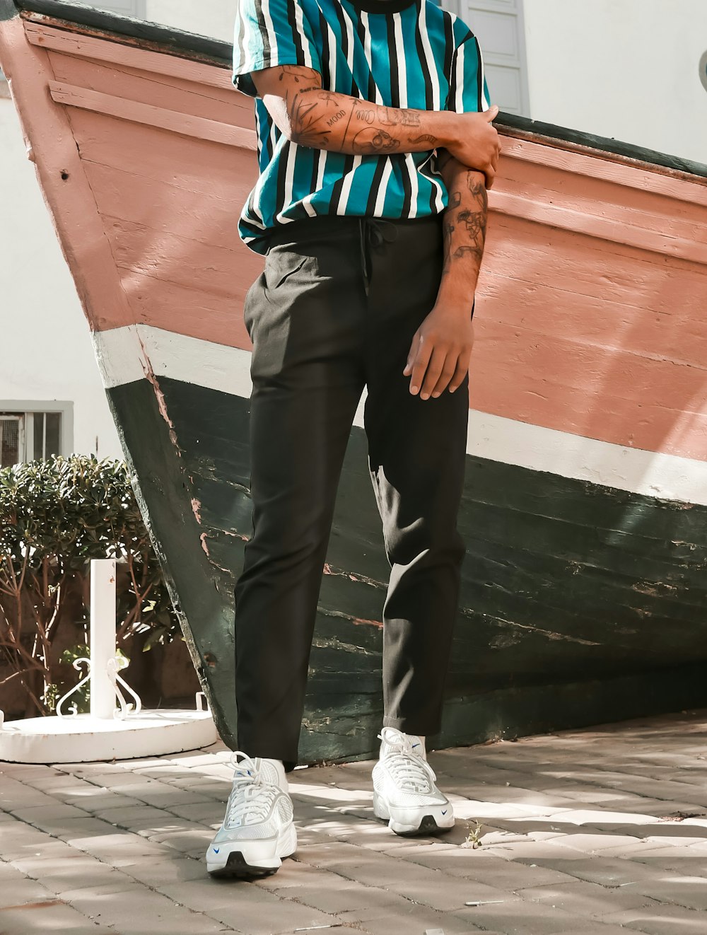 man standing near boat during daytime