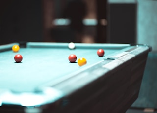 selective focus photography of pool table