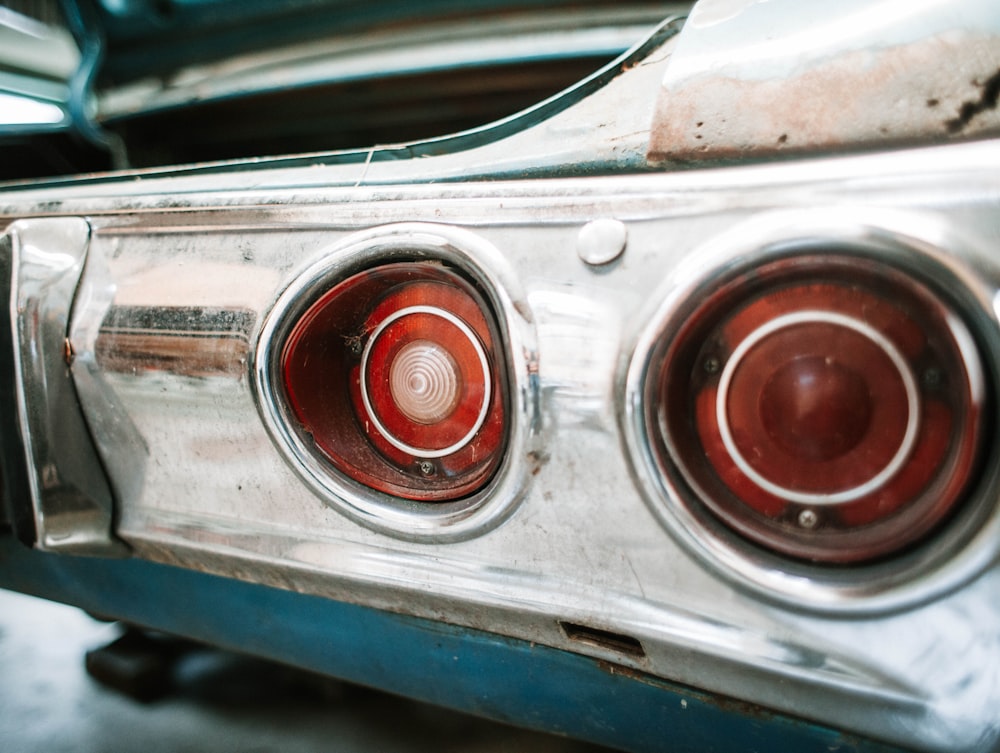 a close up of the front of an old car