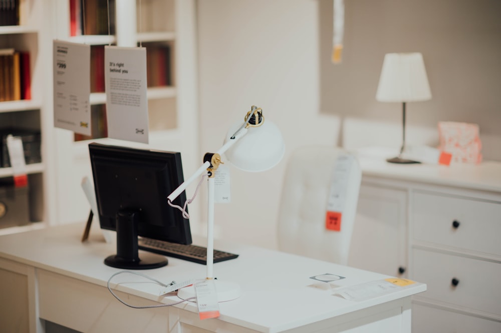 white metal desk lamp