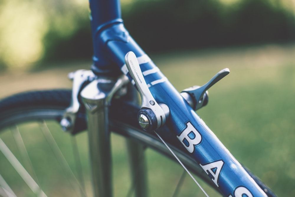 selective focus photography of bicycle