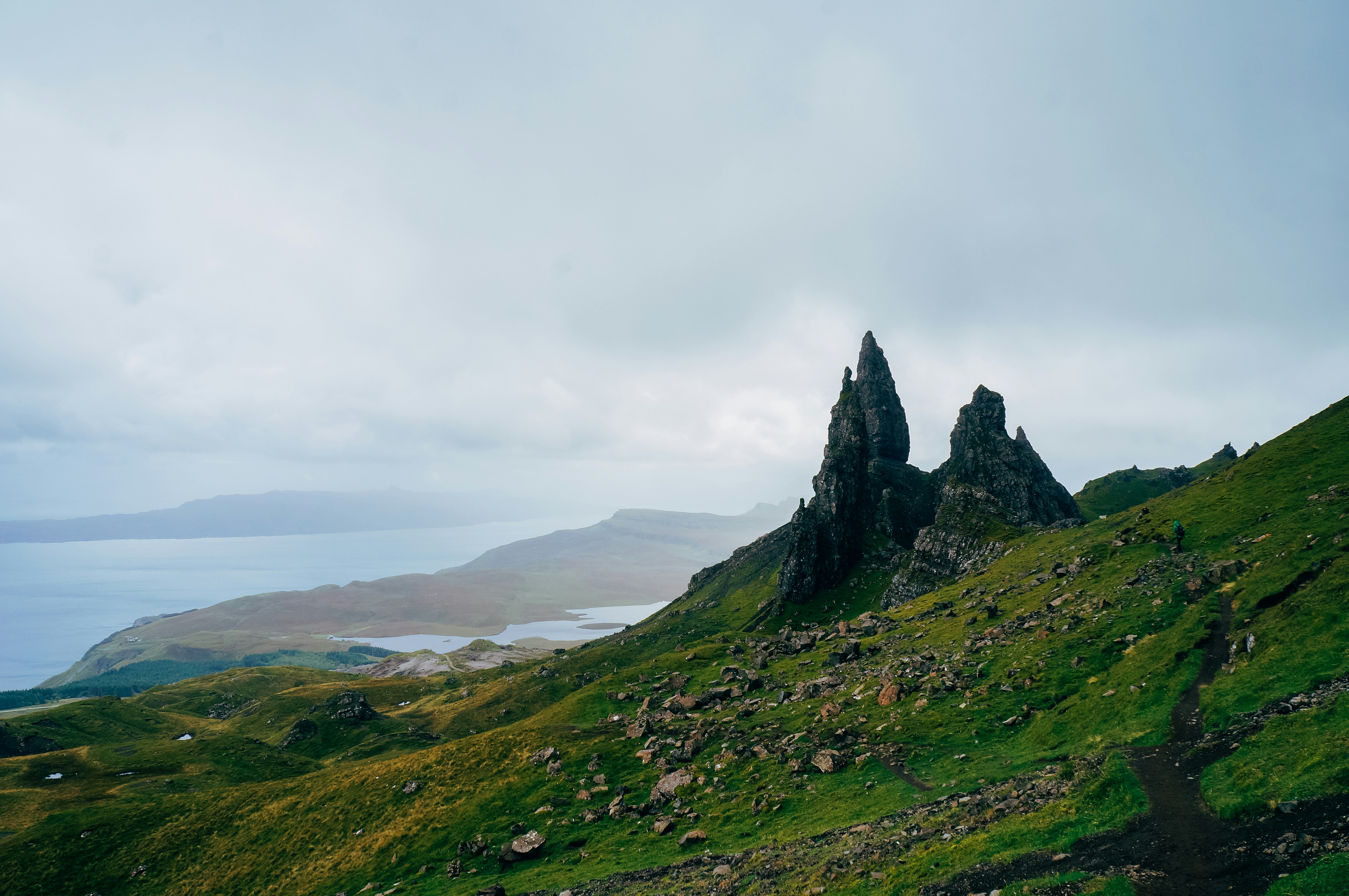 mountains under cloudy sky