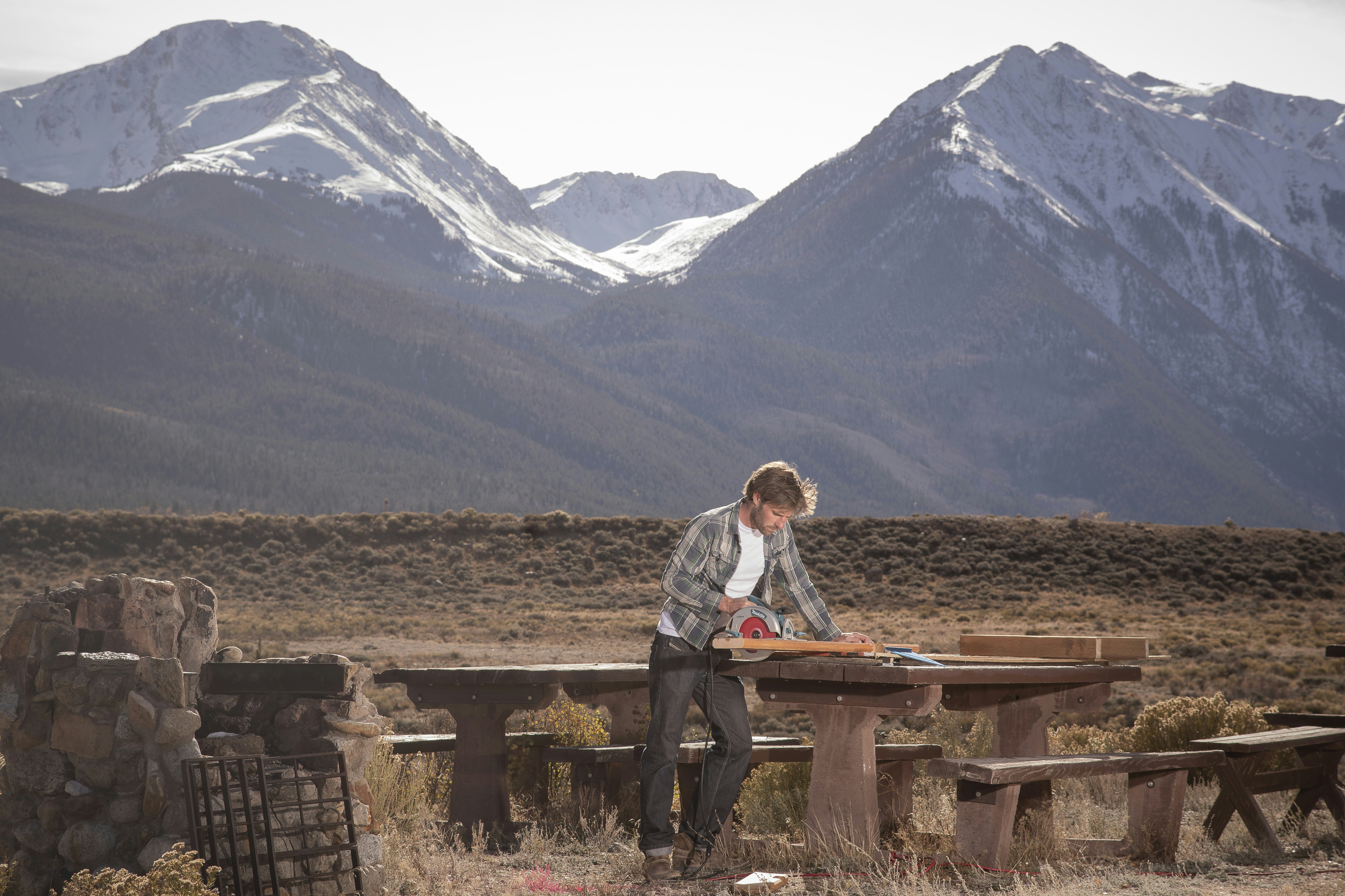 Handyman crafting a table