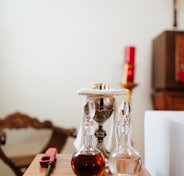 two clear glass decanters on table