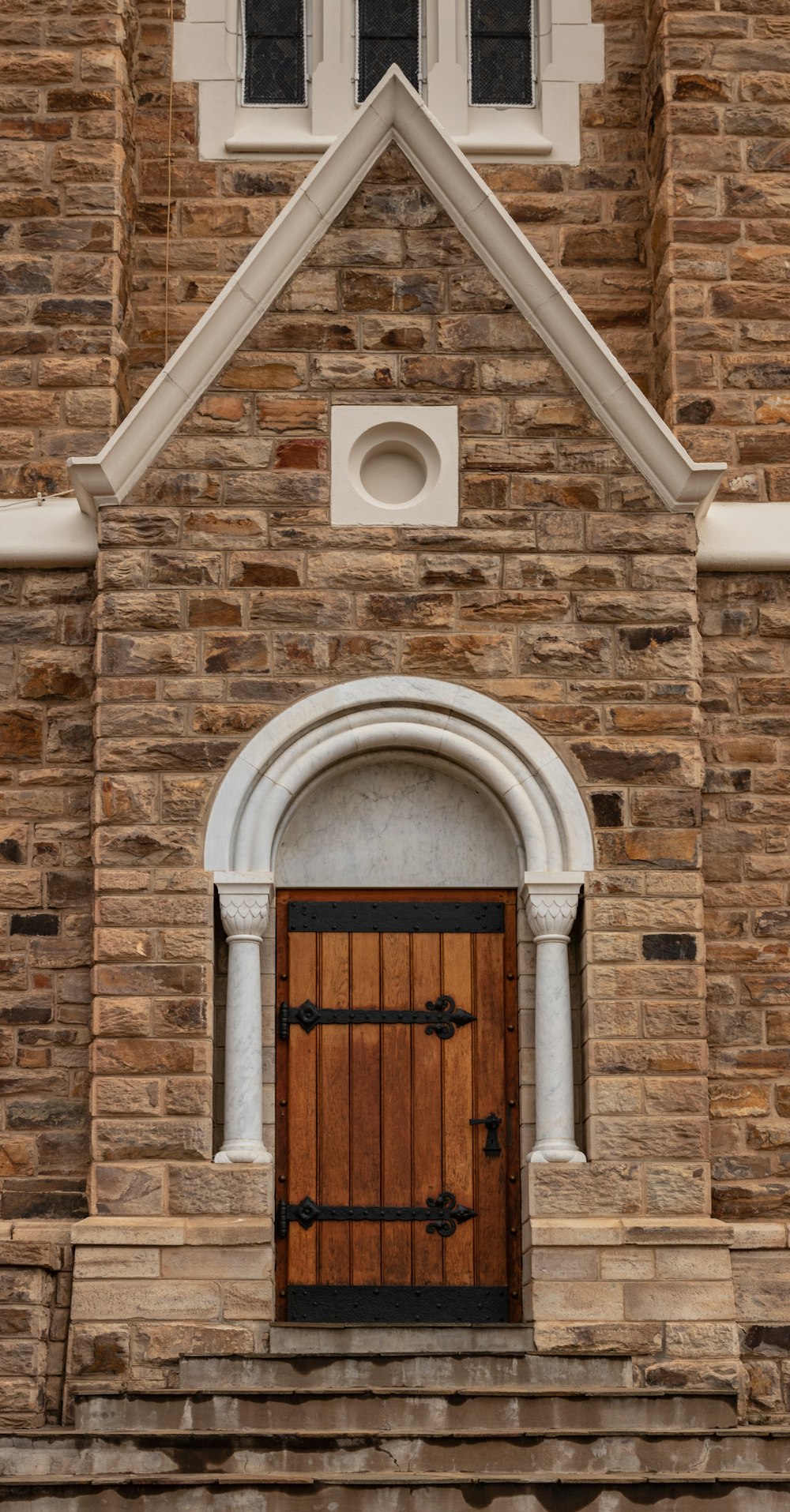 brown and white concrete building door closed