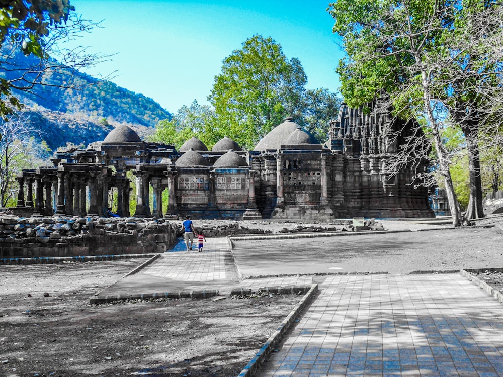 man standing near temple