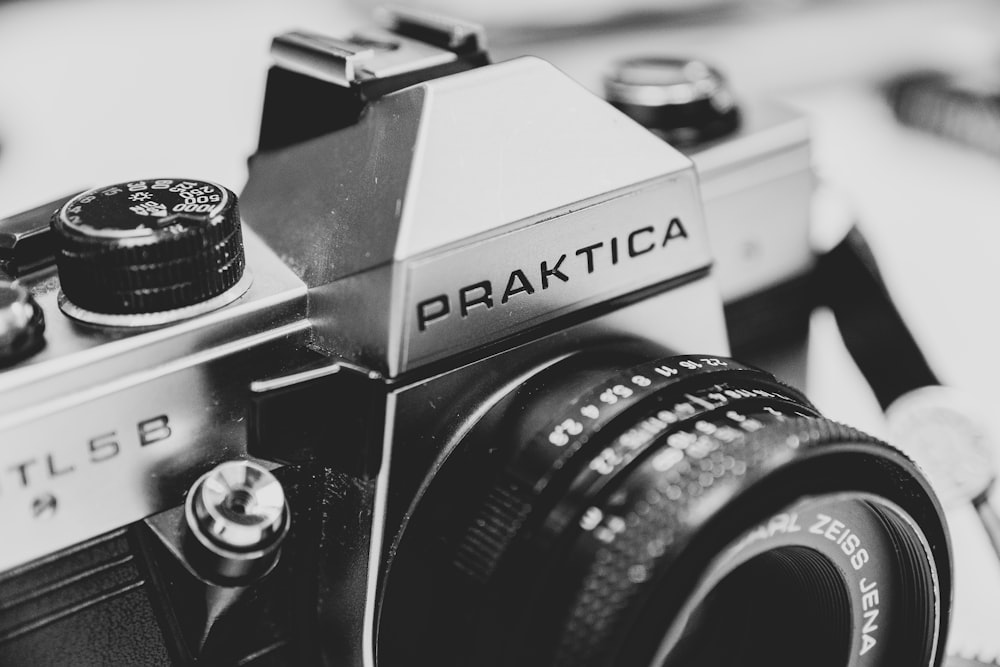 grayscale photo of Praktica camera