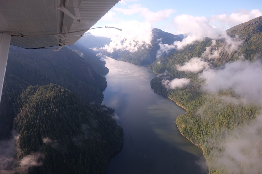 aerial view photography of lake between mountains