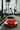 red BMW coupe parked at road