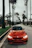 red BMW coupe parked at road
