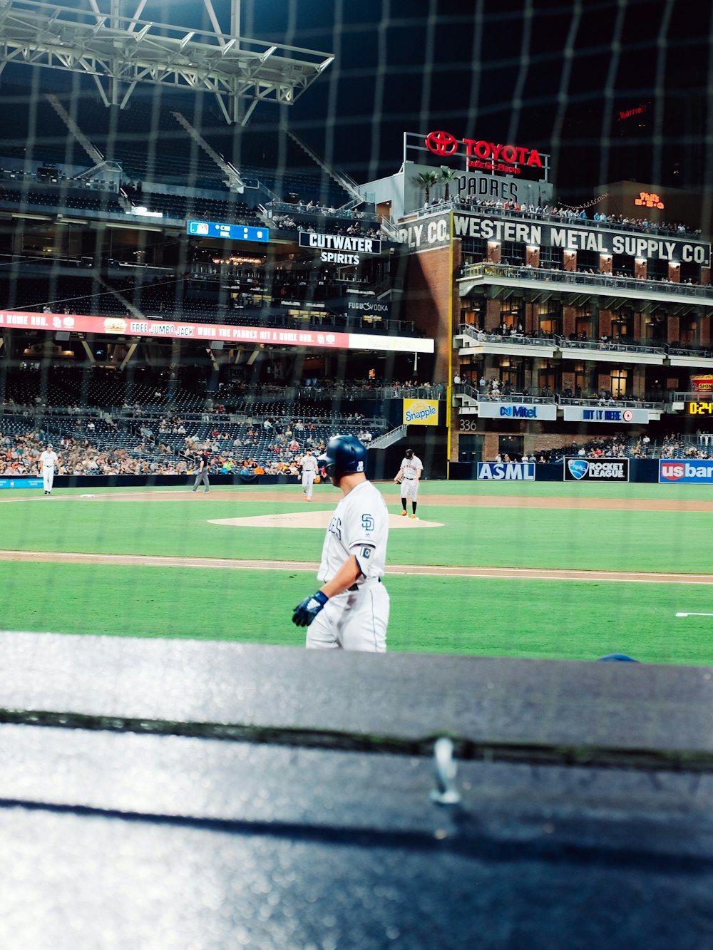 baseball player standing on field