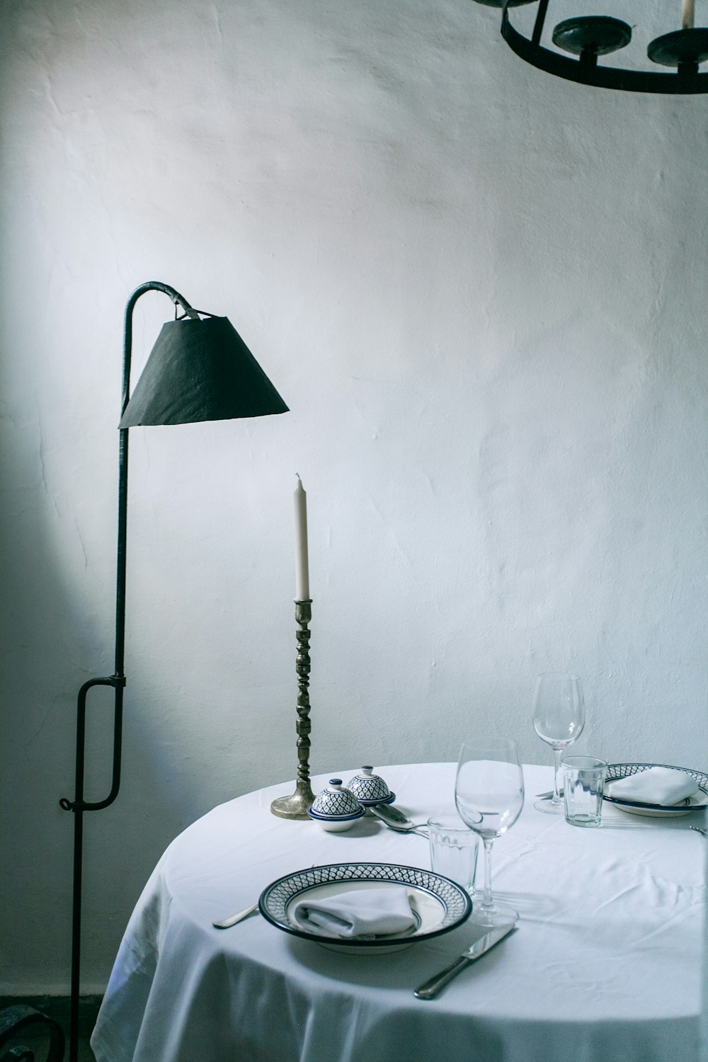 empty plates on white table inside room