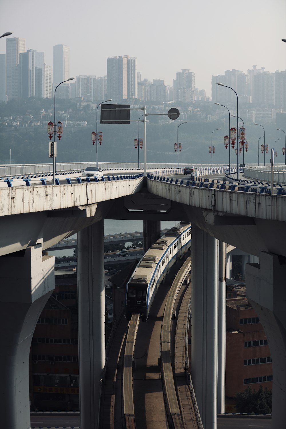 white train in rail during daytime