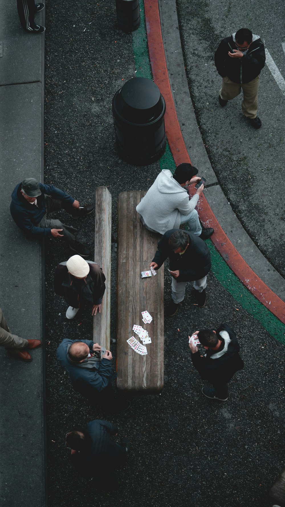 aerial view of men sitting on bench