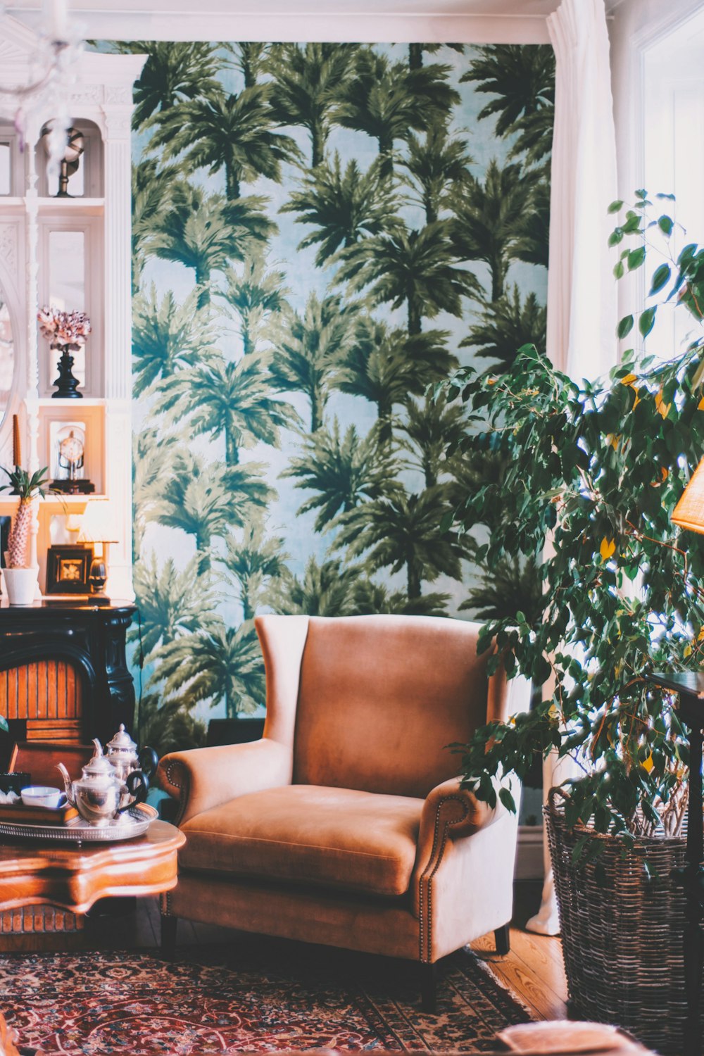 brown sofa chair beside green plant