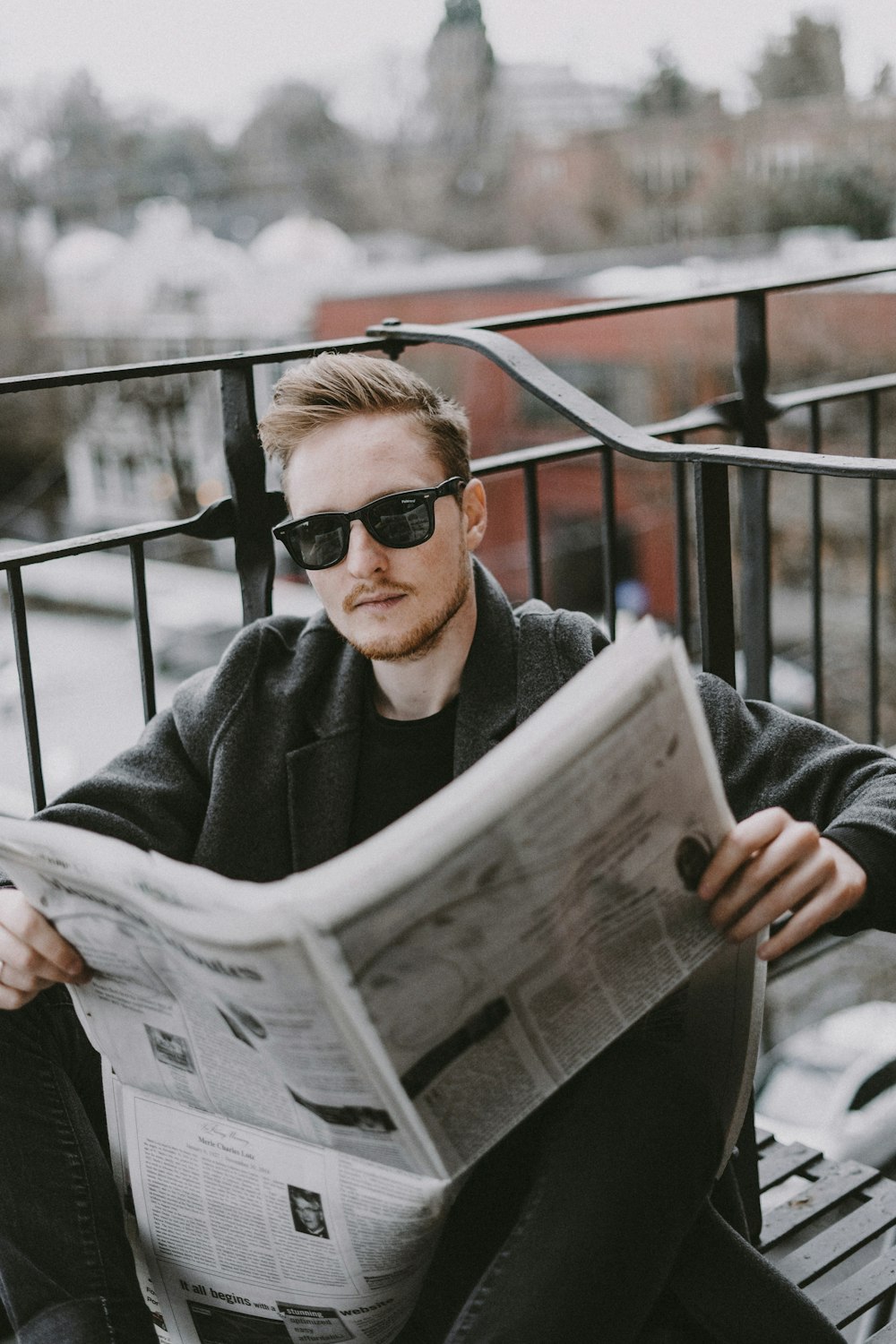 man reading newspaper