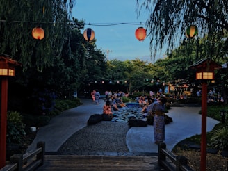 An outdoor gathering where students enjoy Japanese tea ceremony demonstrations.