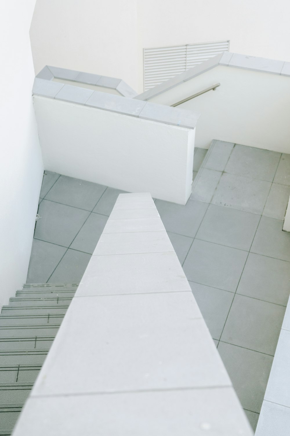 white tile stair