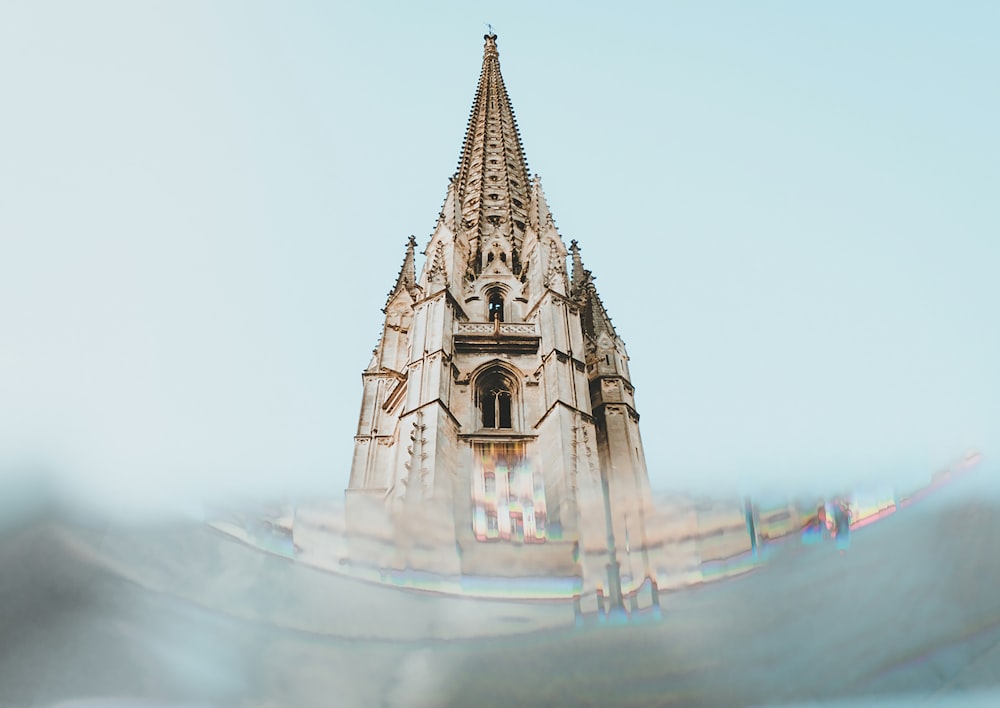 low-angle photography of white concrete cathedral