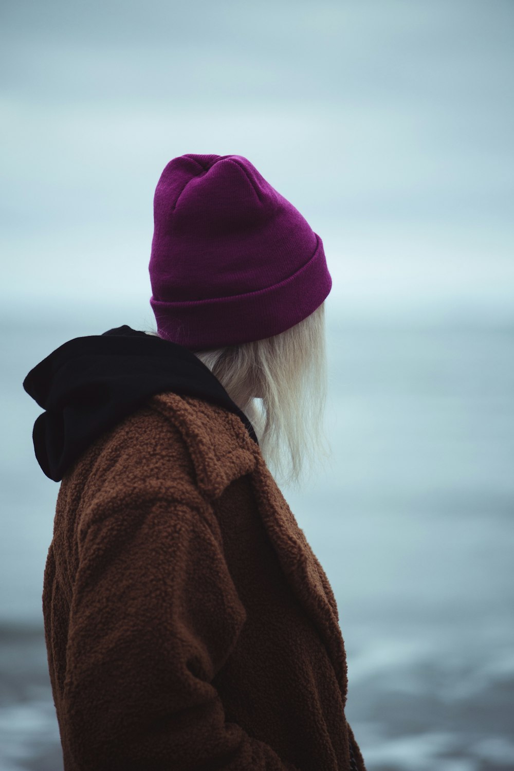 woman in brown coat