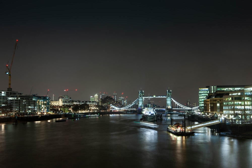 city with bridge under nigh sky