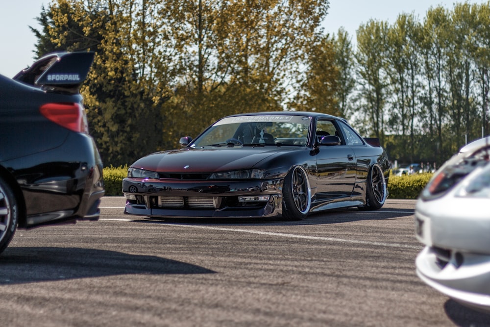 brown Nissan Skyline GT-R r34 on parking space during daytime