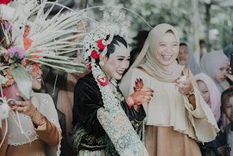 A joyful moment captured during a cultural festival, with colorful costumes and dancing.