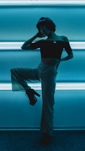 A creative fashion shoot with vibrant lighting and stylish outfits.