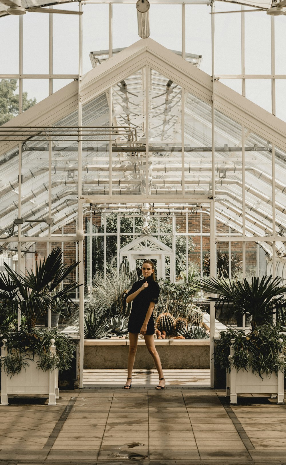 woman standing under tent during daytime