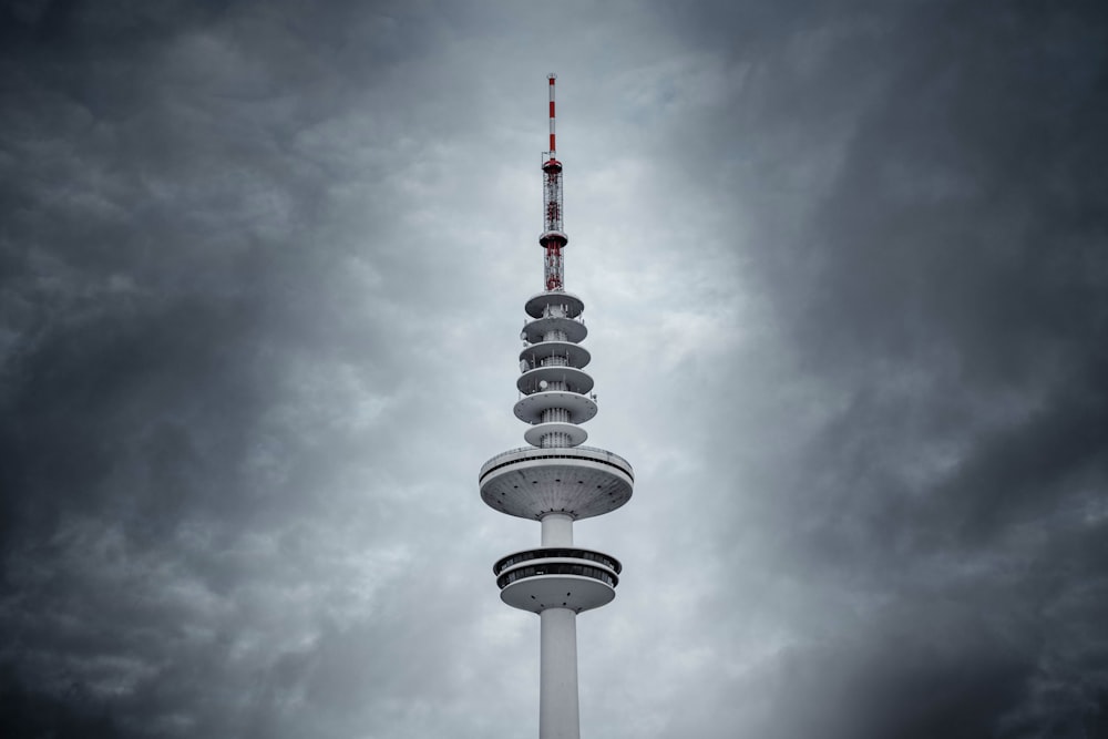 white concrete building under cloudy sky