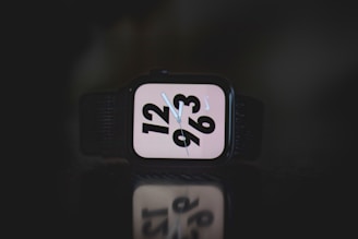 square black Nike analog watch at 3:10