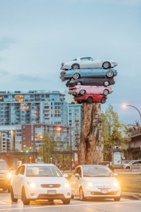 two white cars on road
