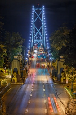 vehicles passing through bridge during night