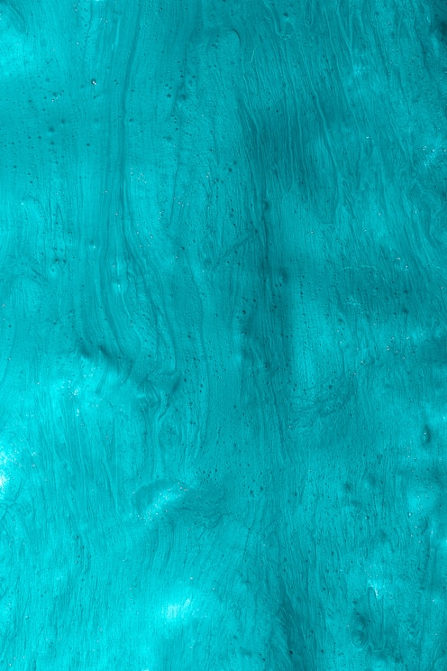 a close up view of a blue water surface