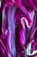 a close up of a purple and white abstract painting