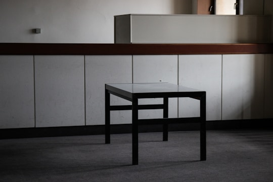 Calm consultation room with brown accents and minimalistic decor.