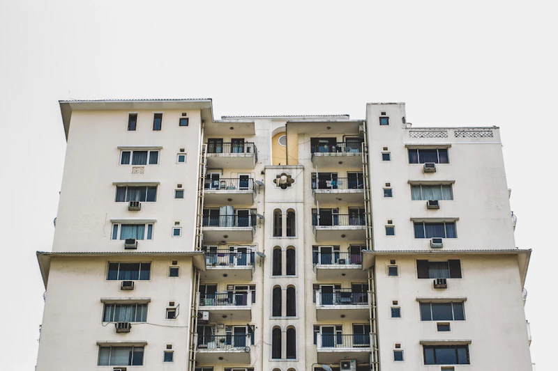 Modern high-rise apartment building in India, representing North Bangalore's airport corridor