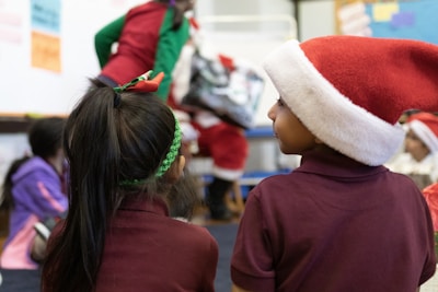 Children excitedly watching their personalized Santa video.