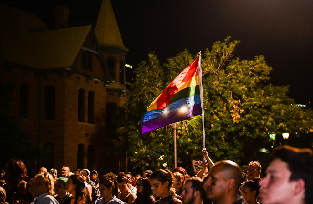 people gathering on street at nighttime