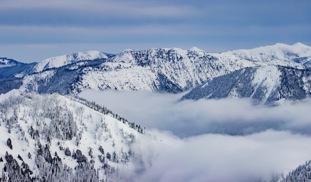 snow-covered mountains under blue sky