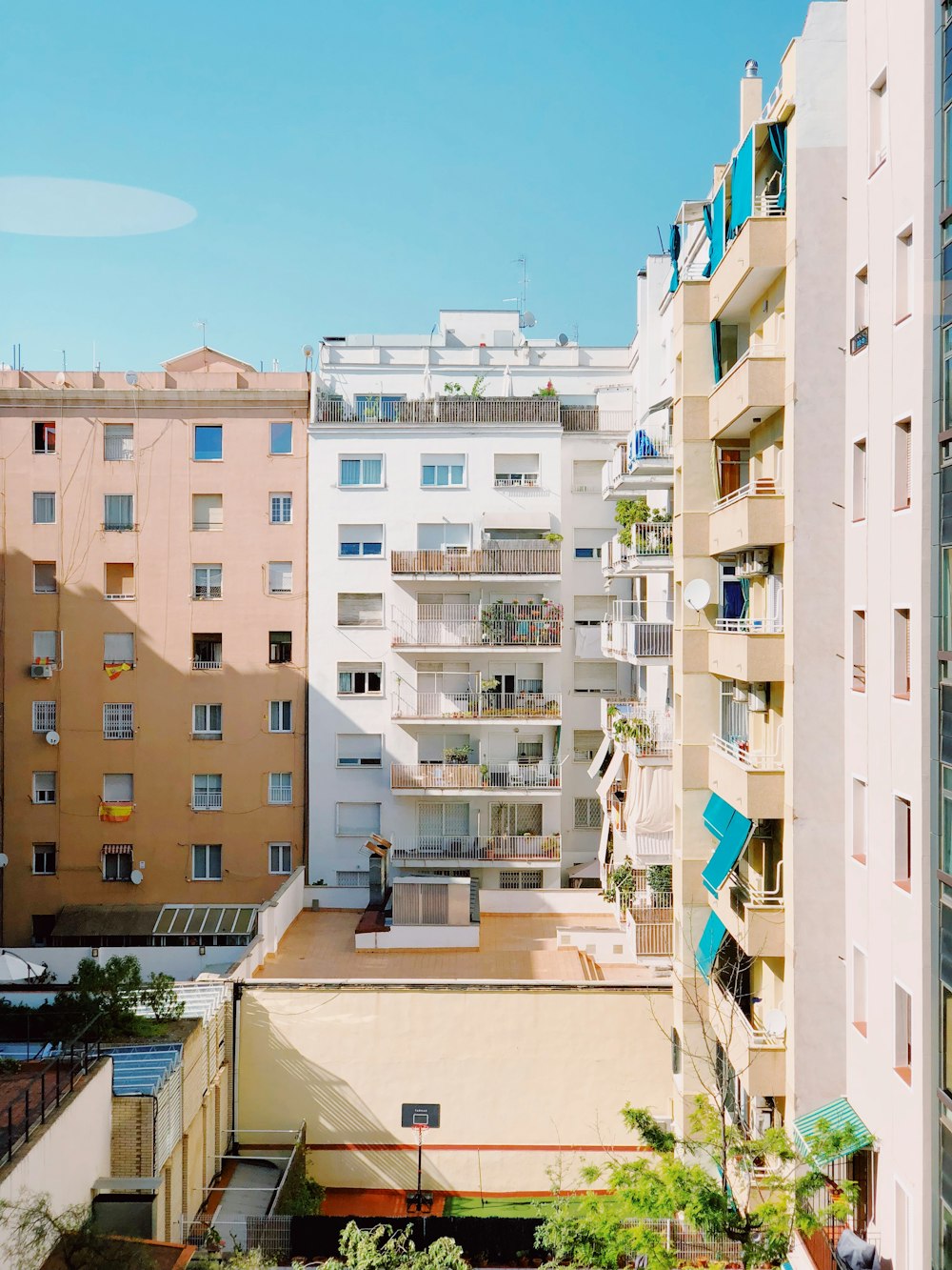 white high rise buildings under blue sky