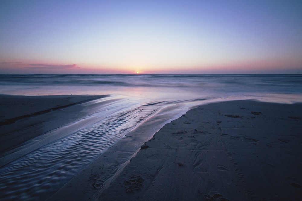 calm water during golden hour