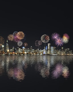 skyline buildings under fireworks display