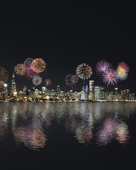 skyline buildings under fireworks display