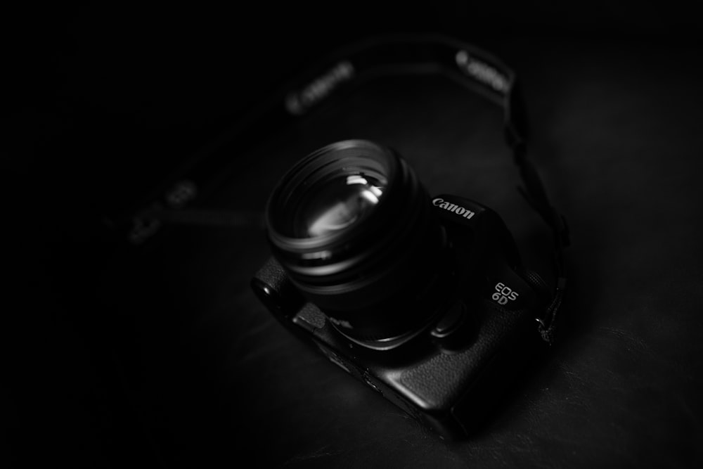 black Canon EOS 60 camera