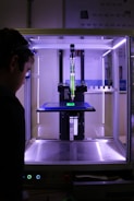 person near 3D printer