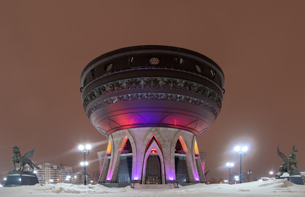 black, red, and purple dome building